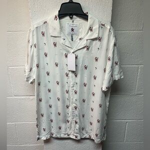 Denim and Flower Christmas Shirt.
Santa lifeguard, surfboard